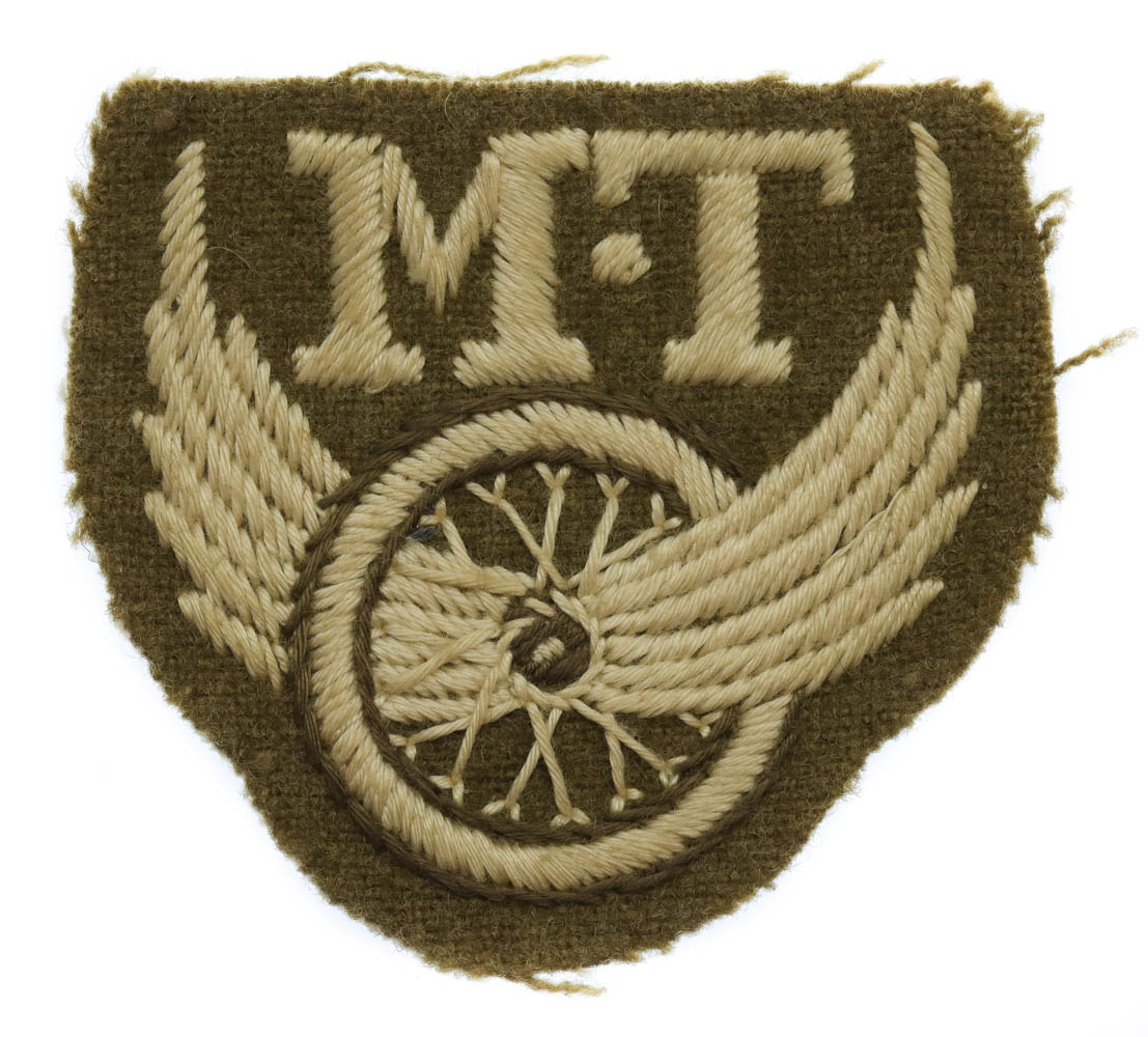 British Army Motor Transport (M.T.) Winged Wheel Cloth Proficiency Arm Badge