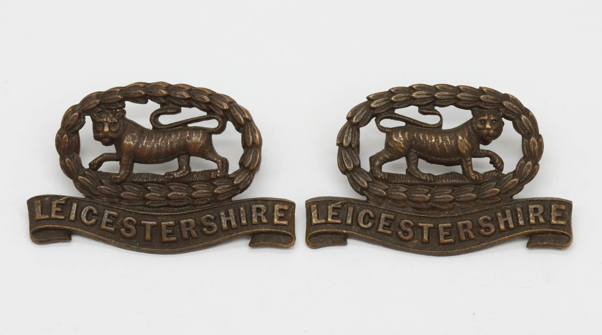 Pair of Leicestershire Regiment Officer's Service Dress Collar Badges