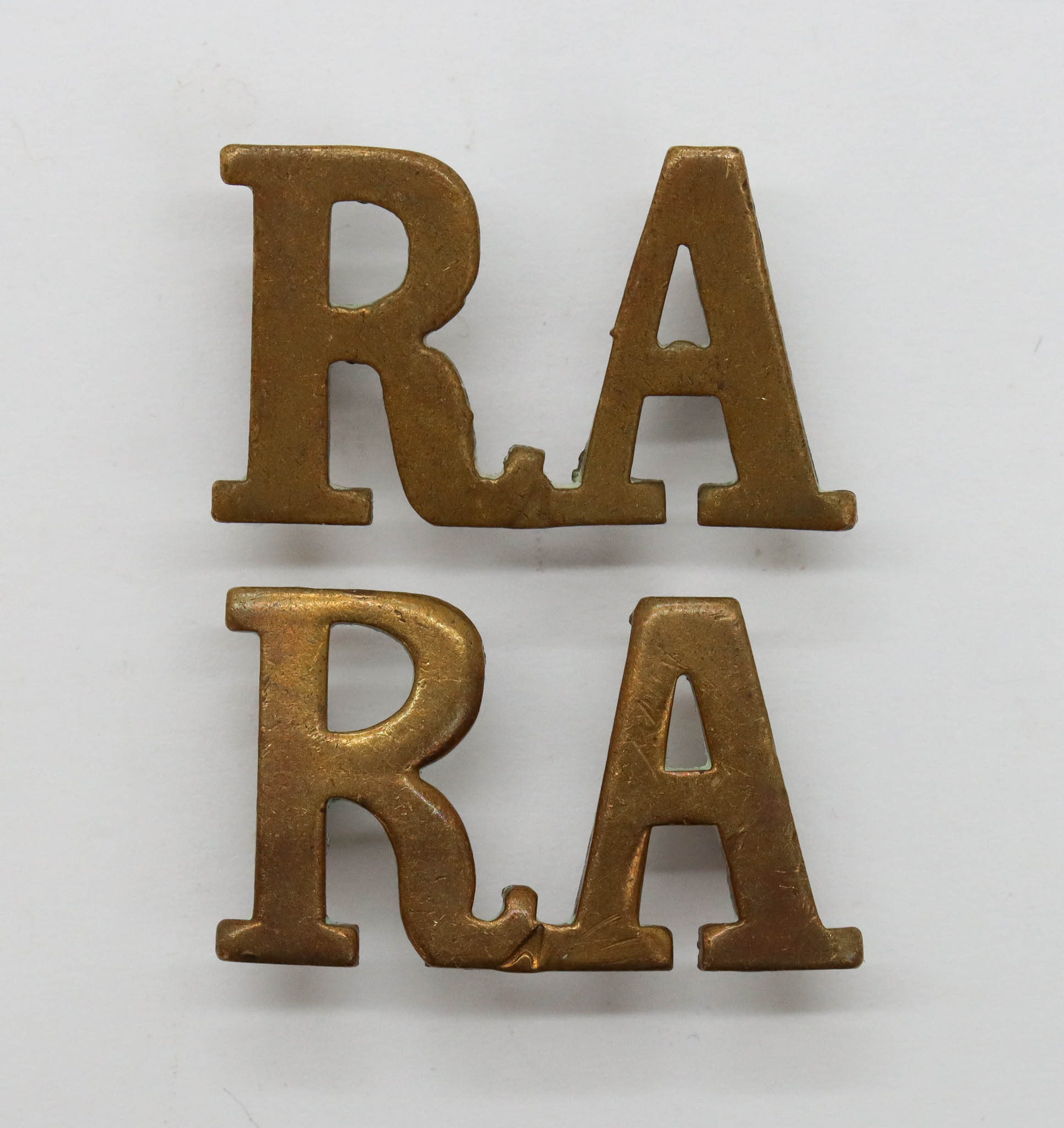 Pair of Royal Artillery (R.A.) Shoulder Titles