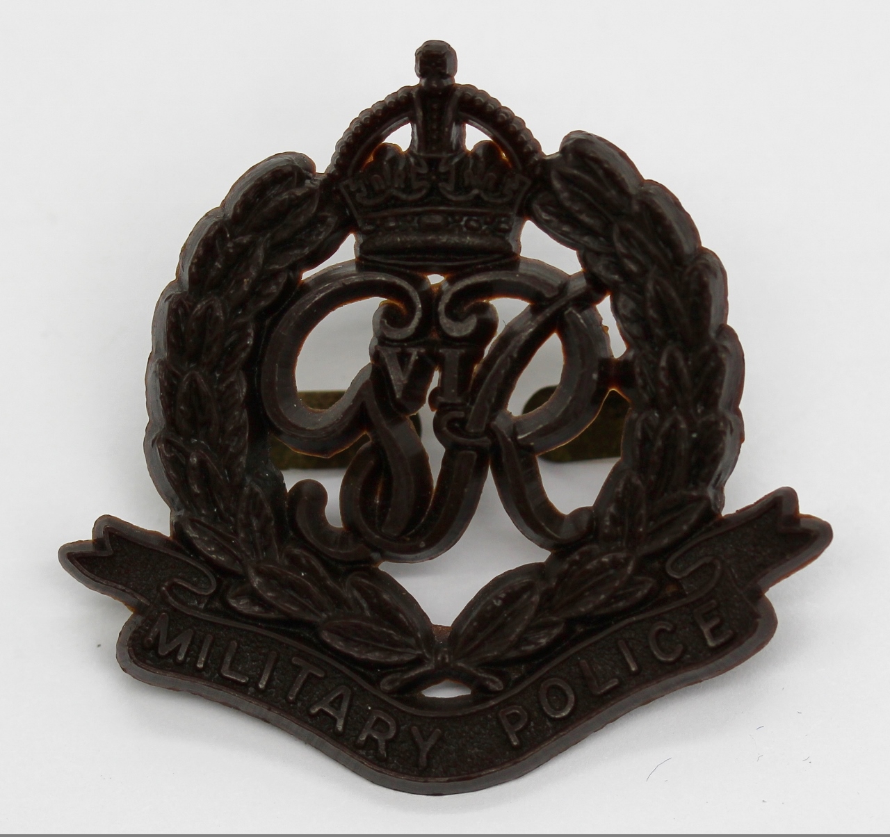 Corps of Military Police WW2 Plastic Economy Cap Badge