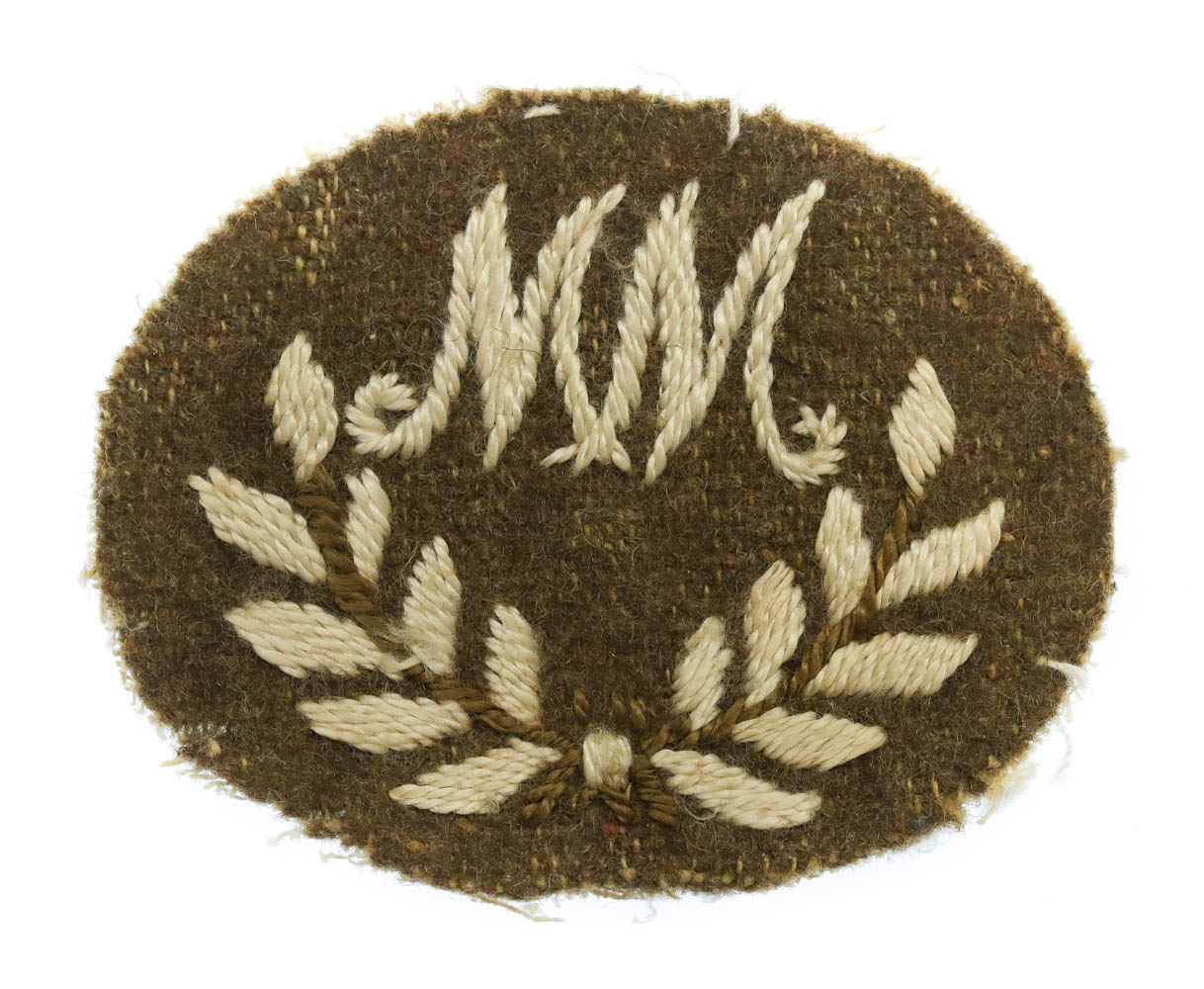 British Army Mortar Man (M.M.) Cloth Proficiency Arm Badge