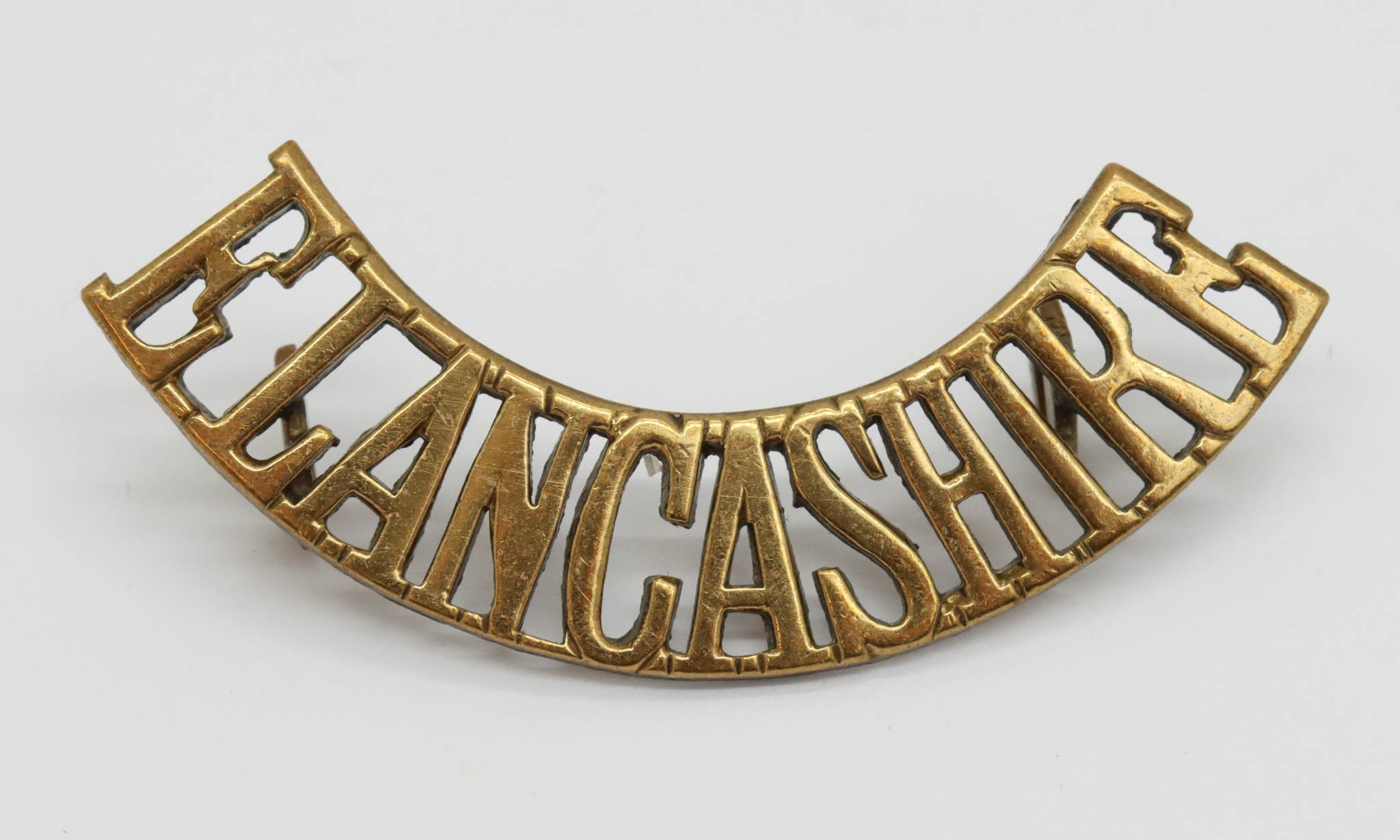 East Lancashire Regiment (E.LANCASHIRE) Shoulder Title