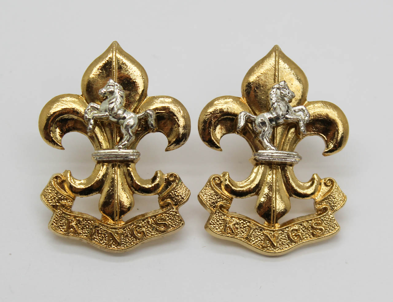 Pair of King's Regiment Bi-Metal Collar Badges