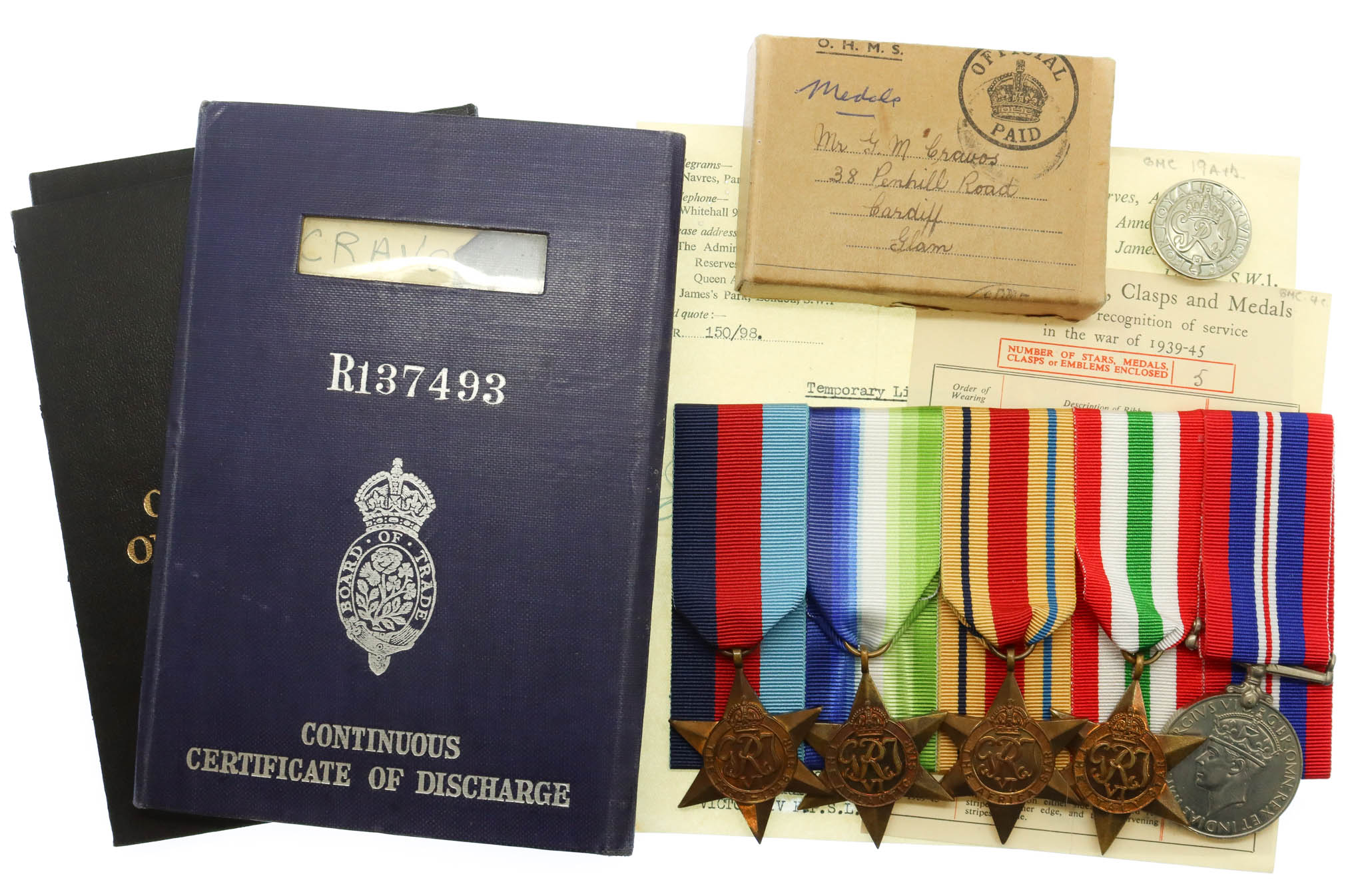 WW2 Medal Group of Five with Box of Issue and Documents - Lieut. G.M. Cravos, Royal Naval Reserve & Merchant Navy