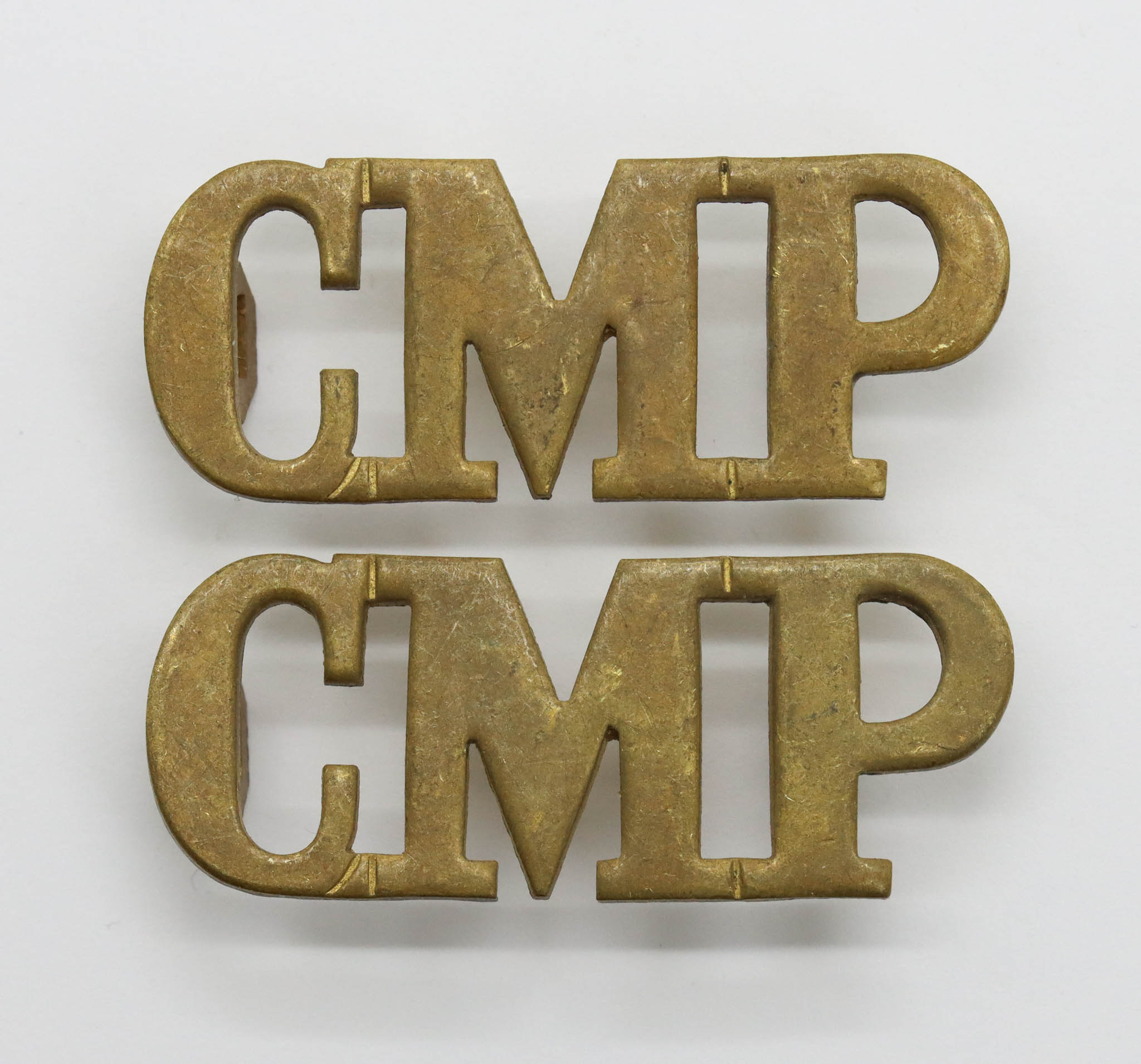 Pair of Corps of Military Police (C.M.P.) Shoulder Titles