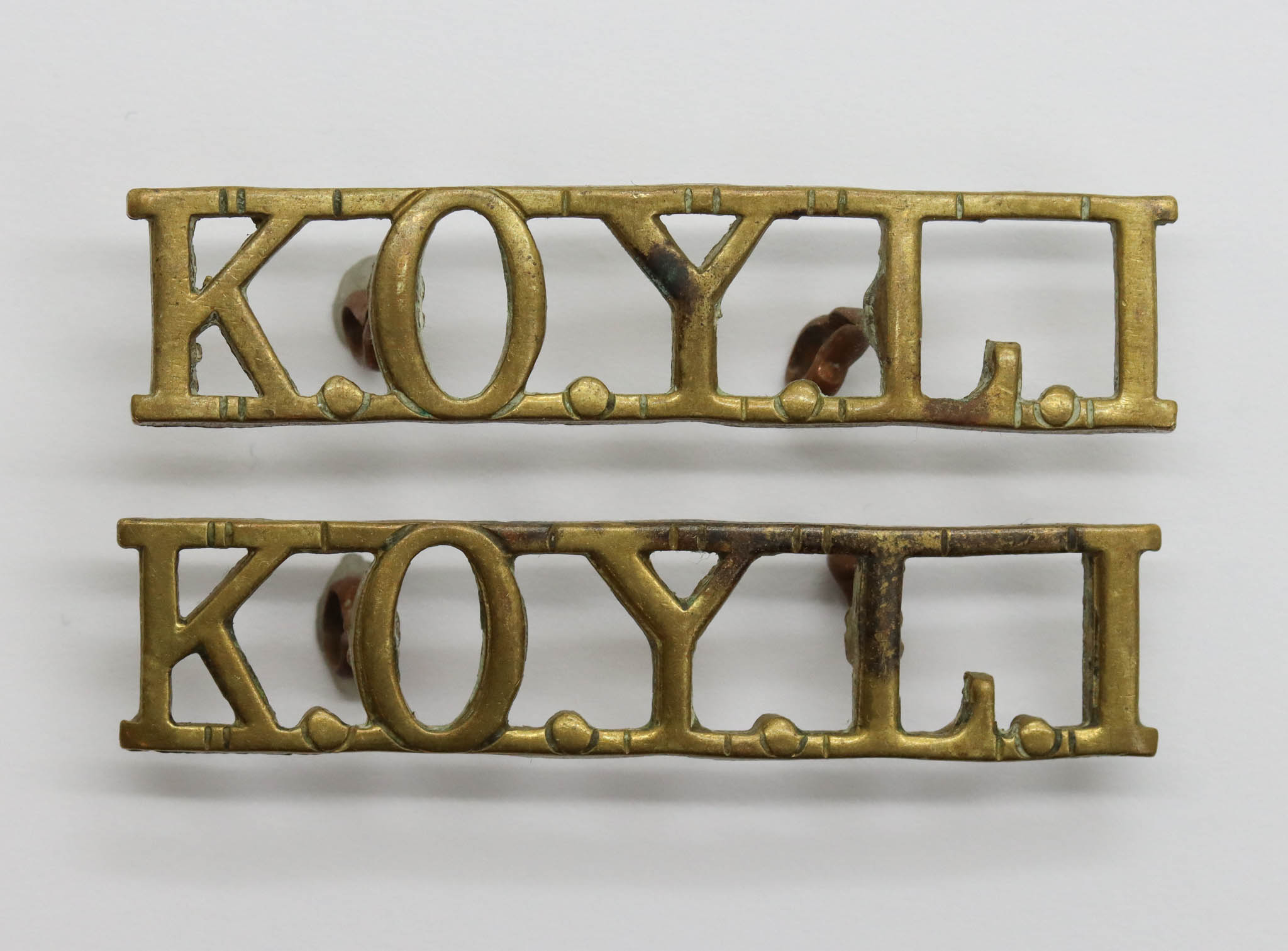 Pair of King's Own Yorkshire Light Infantry (K.O.Y.L.I.) Shoulder Titles