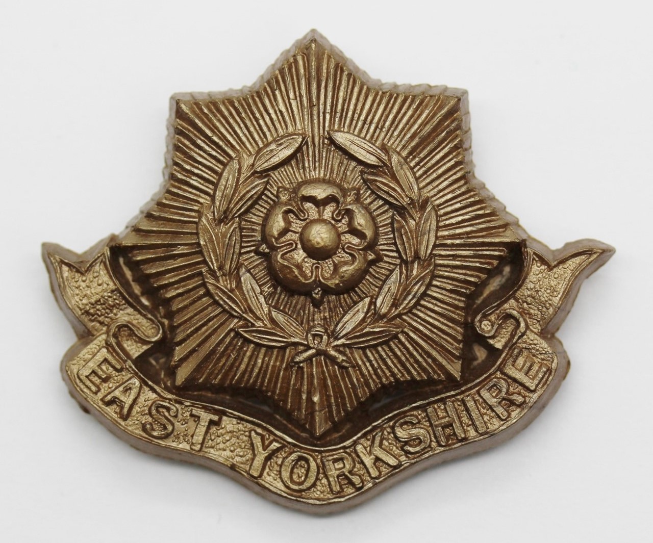 East Yorkshire Regiment WW2 Plastic Economy Cap Badge