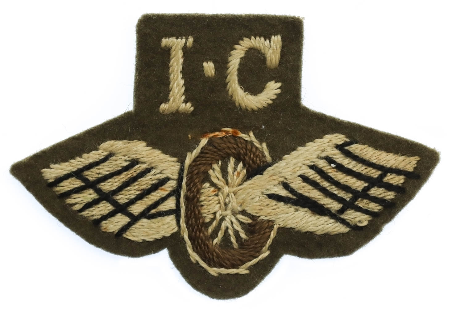 British Army Driver Internal Combustion (I.C.) Winged Wheel Cloth Proficiency Arm Badge