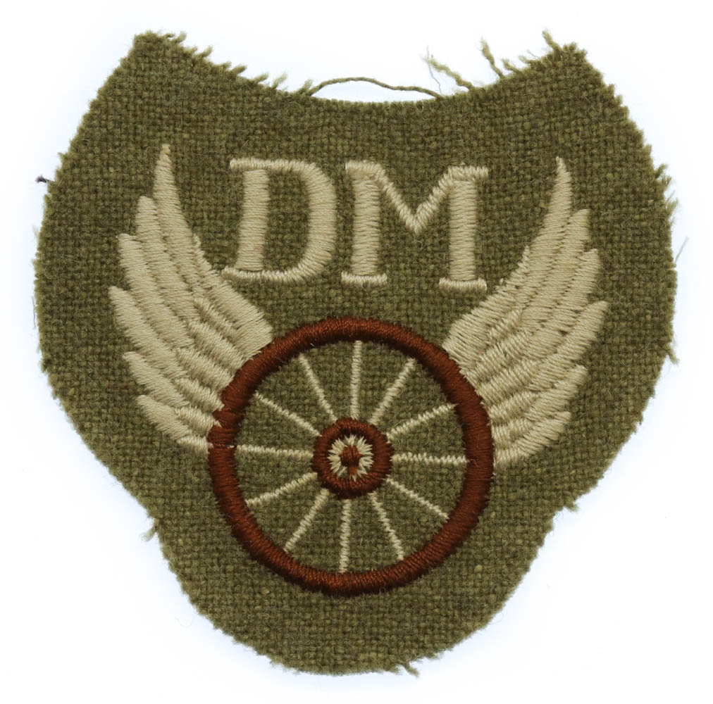 British Army Driver Mechanic (D.M.) Winged Wheel Cloth Proficiency Arm Badge