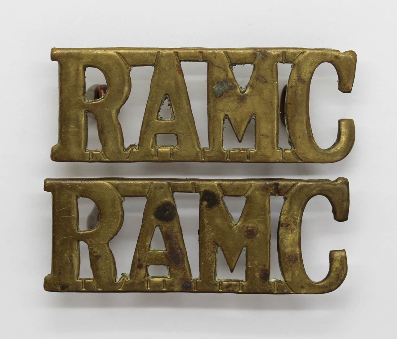 Pair of Royal Army Medical Corps (R.A.M.C.) Shoulder Titles