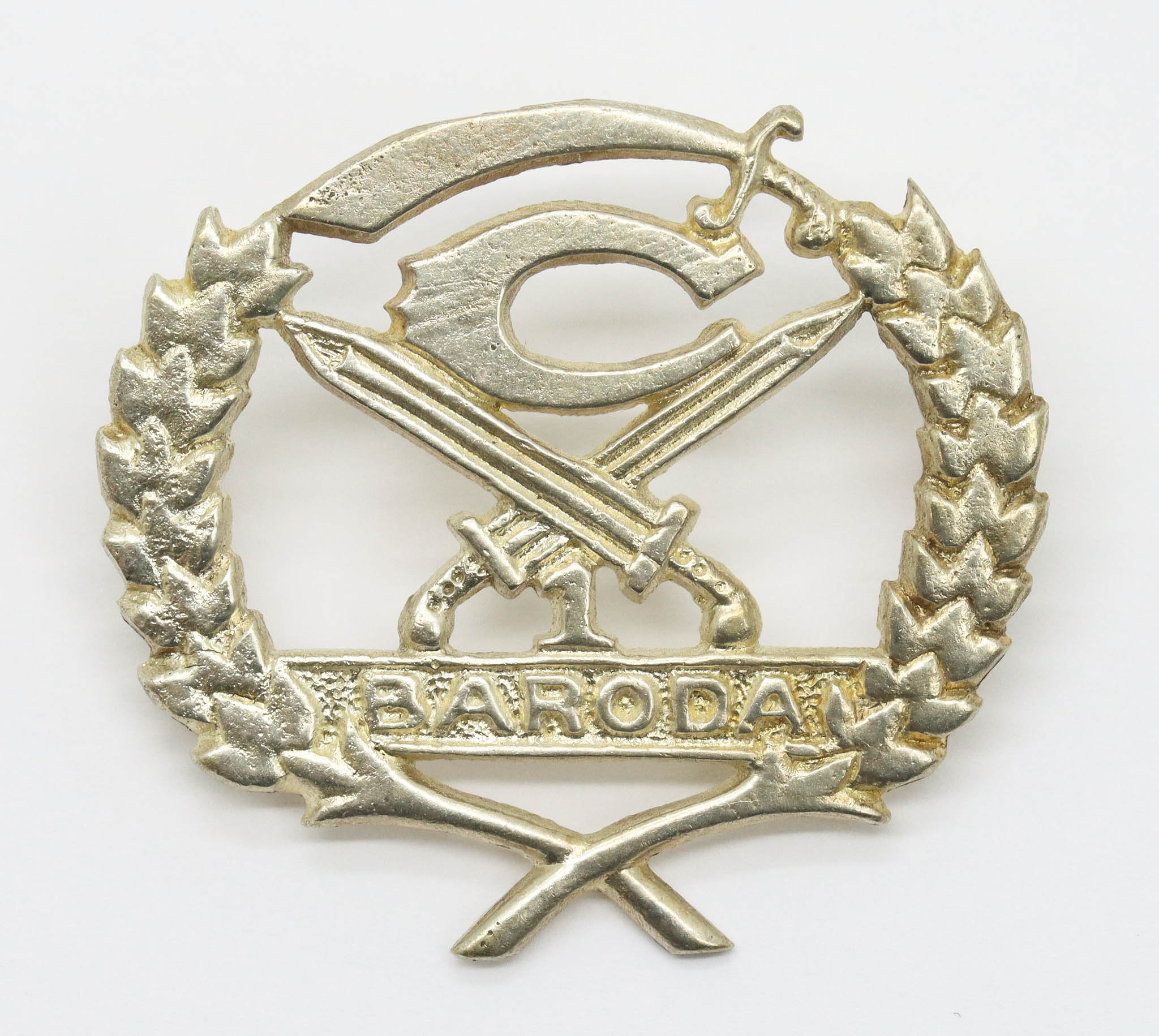 Indian Army 1st Baroda Infantry Cast Cap Badge
