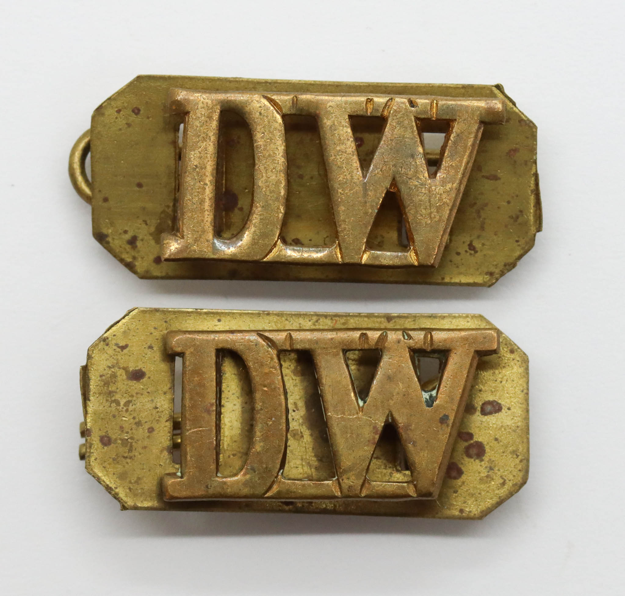 Pair of Duke of Wellington's Regiment (D.W.) Shoulder Titles