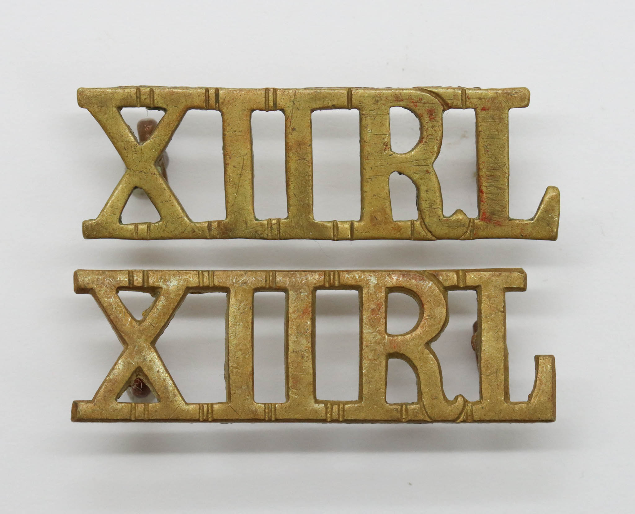 Pair of 12th Royal Lancers (XIIRL) Shoulder Titles