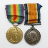 WW1 British War & Victory Medal Pair - Pte. H. Outram, Machine Gun Corps - Prisoner of War