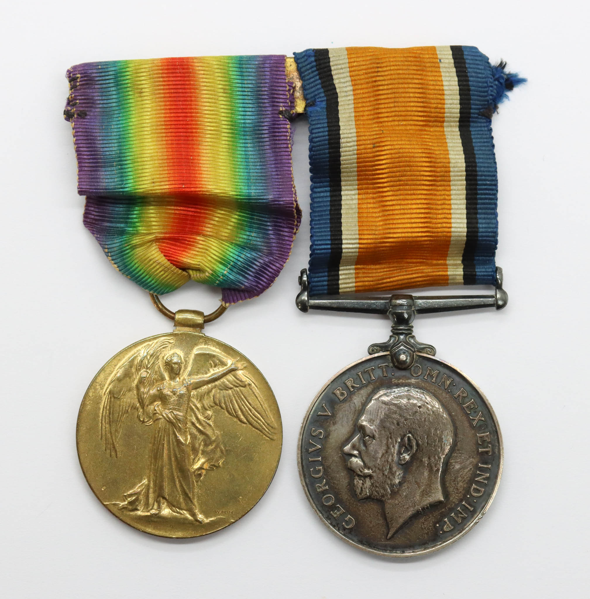 WW1 British War & Victory Medal Pair - Pte. H. Outram, Machine Gun Corps - Prisoner of War