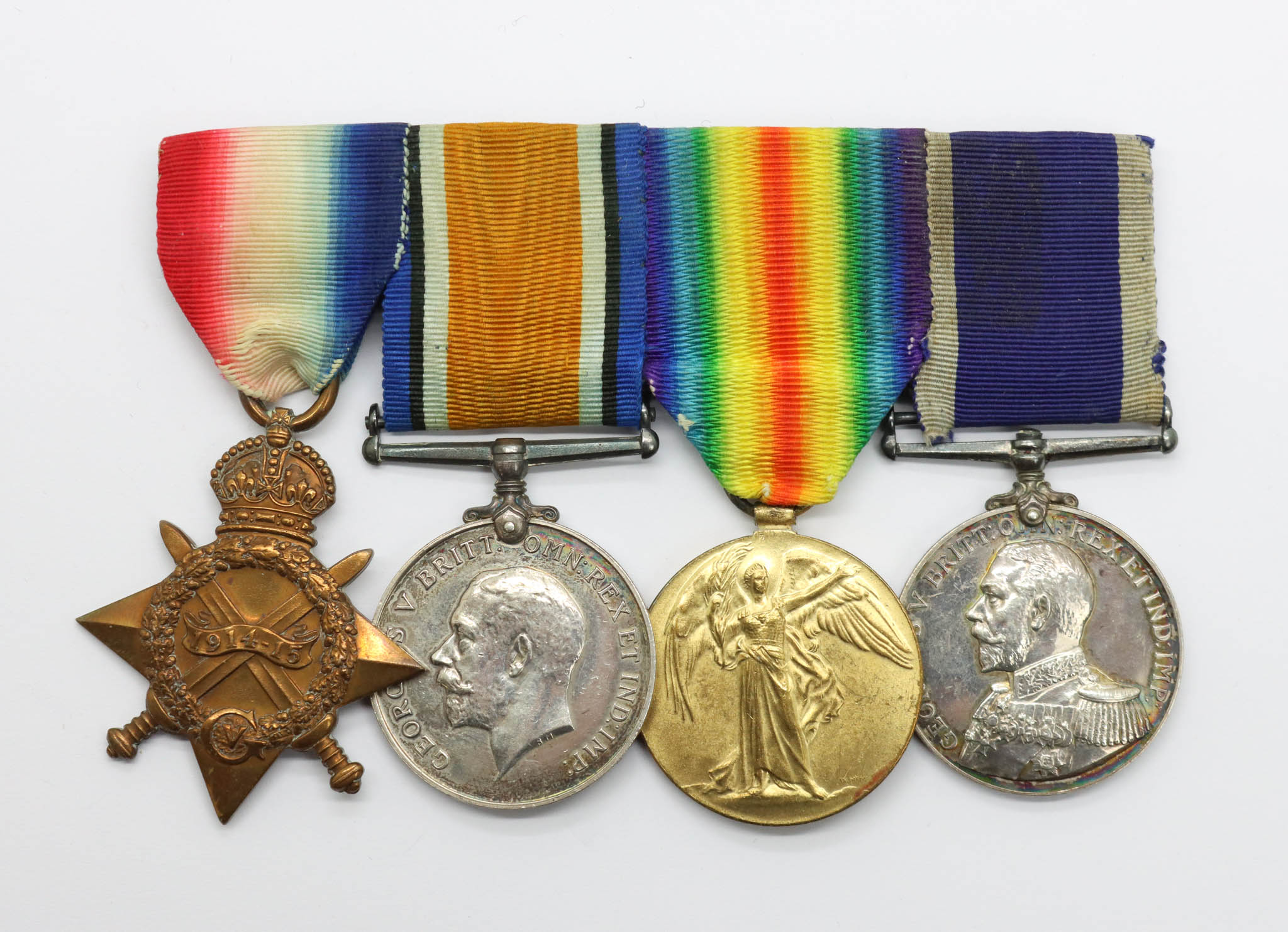 WW1 1914-15 Star Medal Trio and Royal Naval Long Service & Good Conduct Medal Group of Four - Victualling Chief Petty Officer E. Folland, Royal Navy
