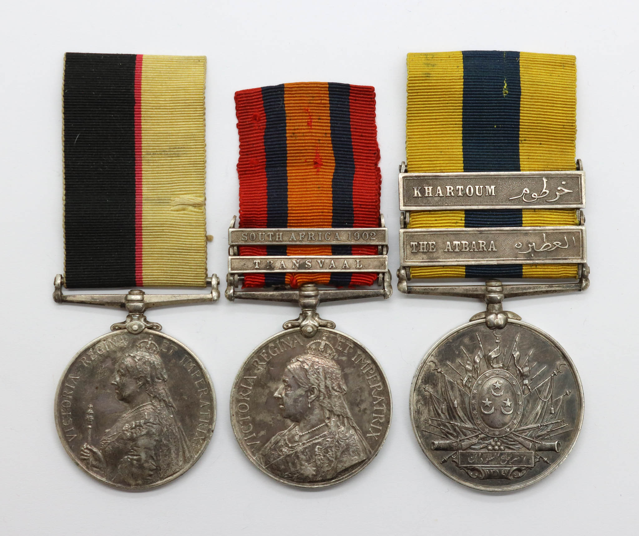 Queen's Sudan, Queen's South Africa (Clasps - Transvaal, South Africa 1902) and Khedives Sudan (Clasps - The Atbara, Khartoum) Medal Group of Three - Pte. H. Garton, Lincolnshire Regiment - Wounded at the Battle of Atbara