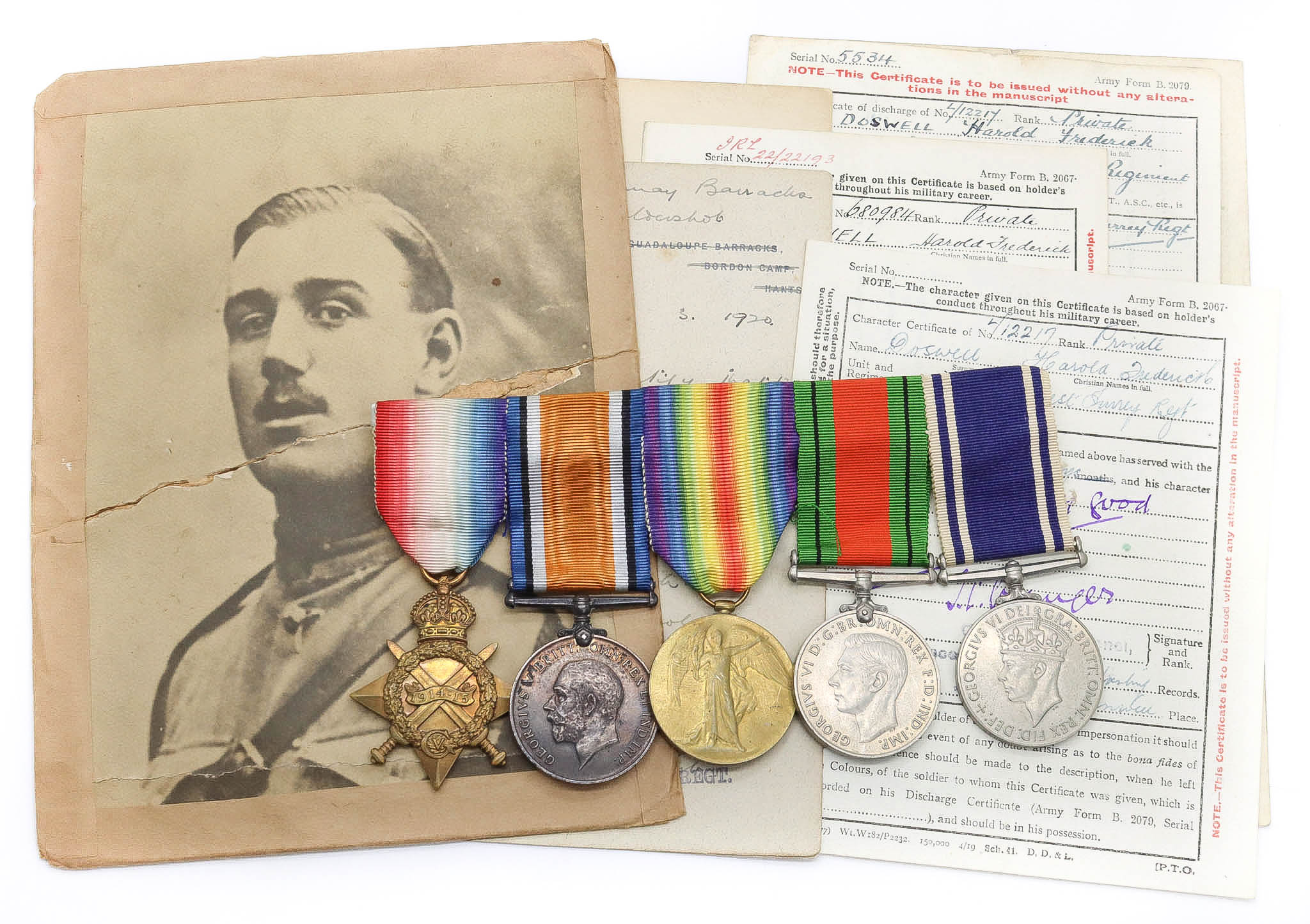 WW1 1914-15 Star Medal Trio, WW2 Defence Medal & George VI Police Long Service & Good Conduct Medal Group of Five - Cpl. H.F. Doswell, 22nd London Regiment & Military Foot Police