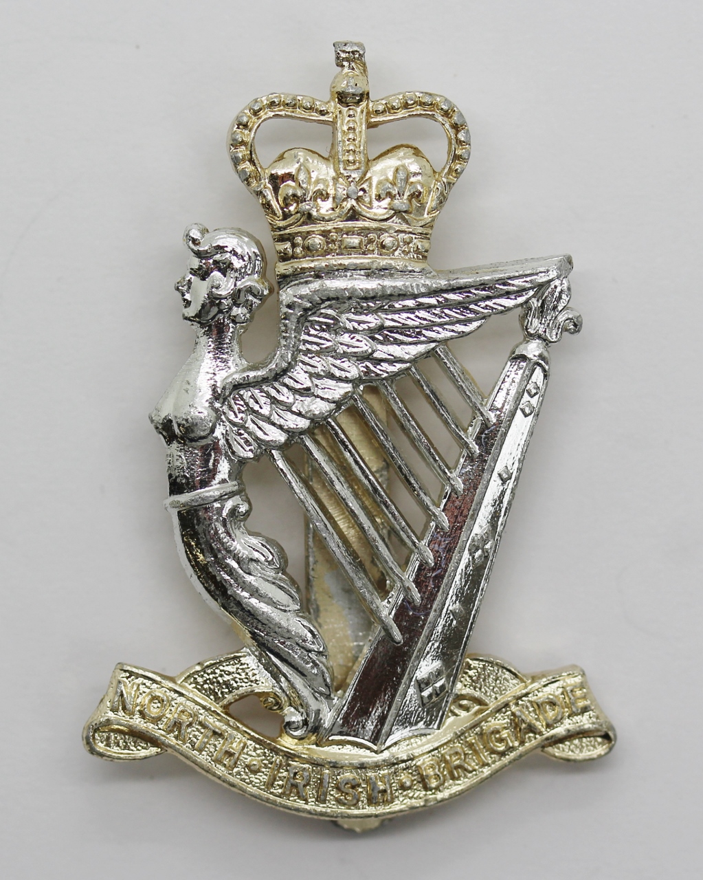 North Irish Brigade Anodised (Staybright) Cap Badge - Queen's Crown