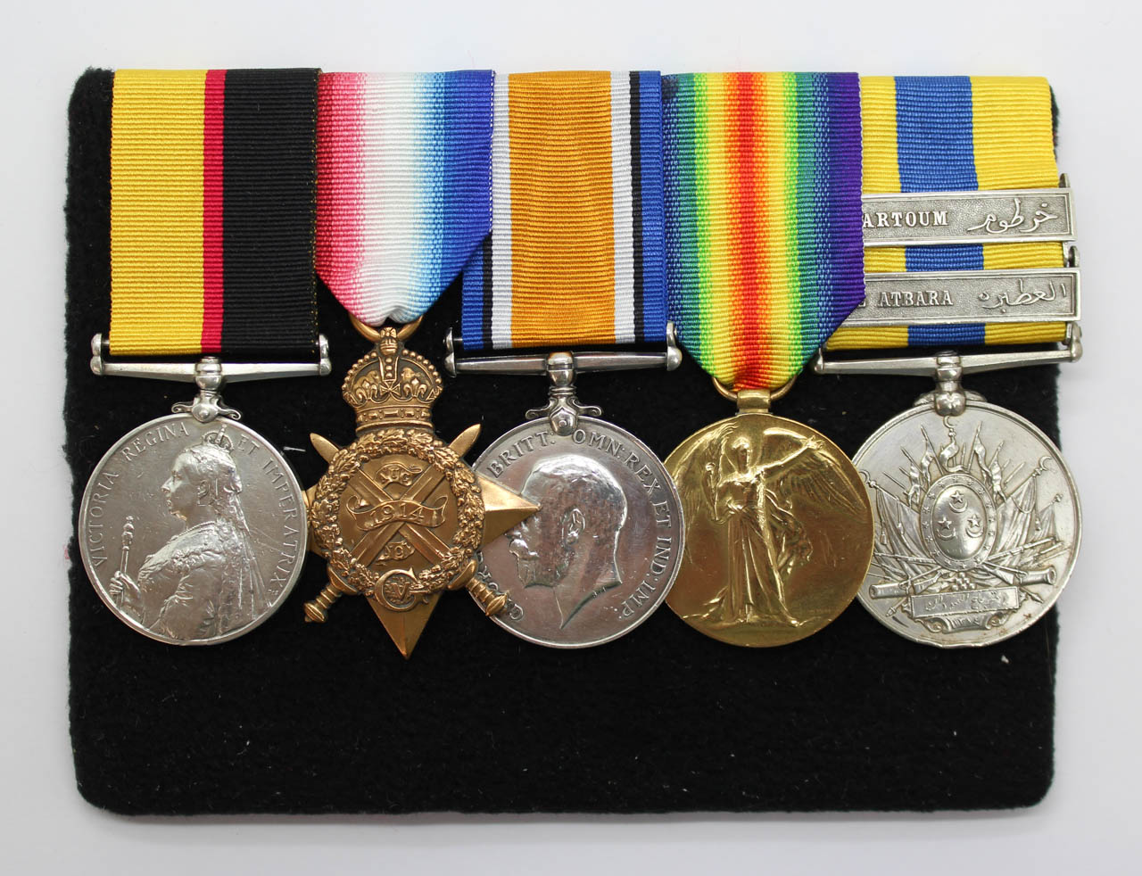 Queen's Sudan, 1914 Mons Star Trio and Khedives Sudan (Clasps - The Atbara, Khartoum) Medal Group of Five - Pte. T.H. Jones, Lincolnshire Regiment