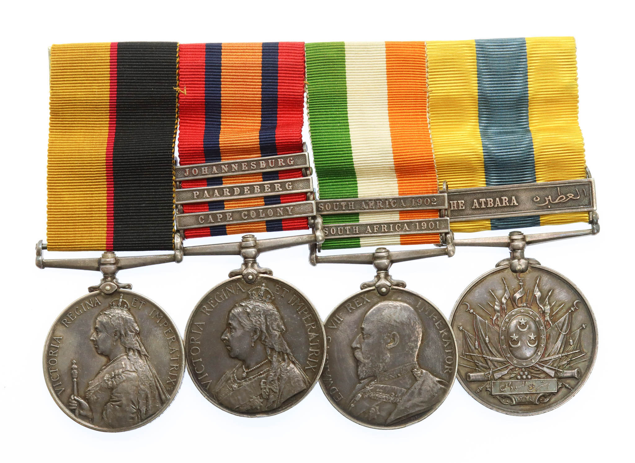 Queen's Sudan, QSA (Clasps - Cape Colony, Paardeberg, Johannesberg), KSA (Clasps - South Africa 1901, South Africa 1902) and Khedives Sudan (Clasps - The Atbara) Medal Group of Four - Pte. F. Stringer, Lincolnshire Regiment - Boer War Prisoner of War (Zilikats Nek)