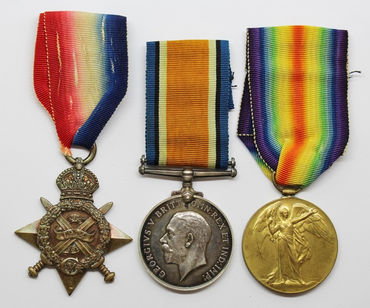 WW1 1914 Mons Star Medal Trio - Pte. G.W. Cunningham, 1st Bn. Lincolnshire Regiment - Wounded (Somme)