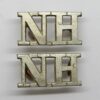 Pair of Northumberland Hussars (N.H.) Shoulder Titles
