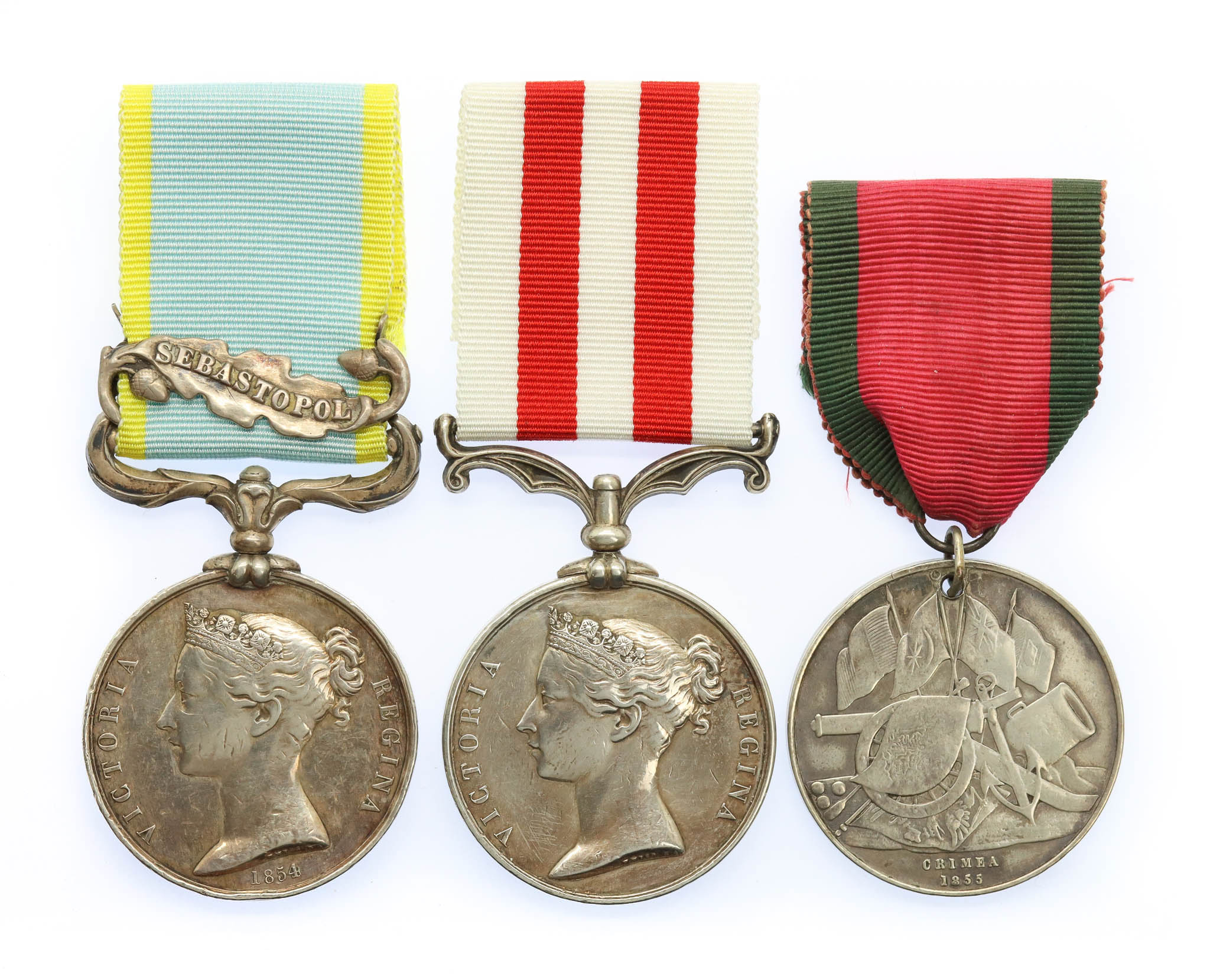 1854 Crimea Medal (Clasp - Sebastopol), Indian Mutiny Medal & Turkish Crimea Medal Casualty Group of Three - Pte. H. Buckley, 2nd Bn. Rifle Brigade - Severley Wounded at the Final Attack on the Redan and Wounded at Cawnpore