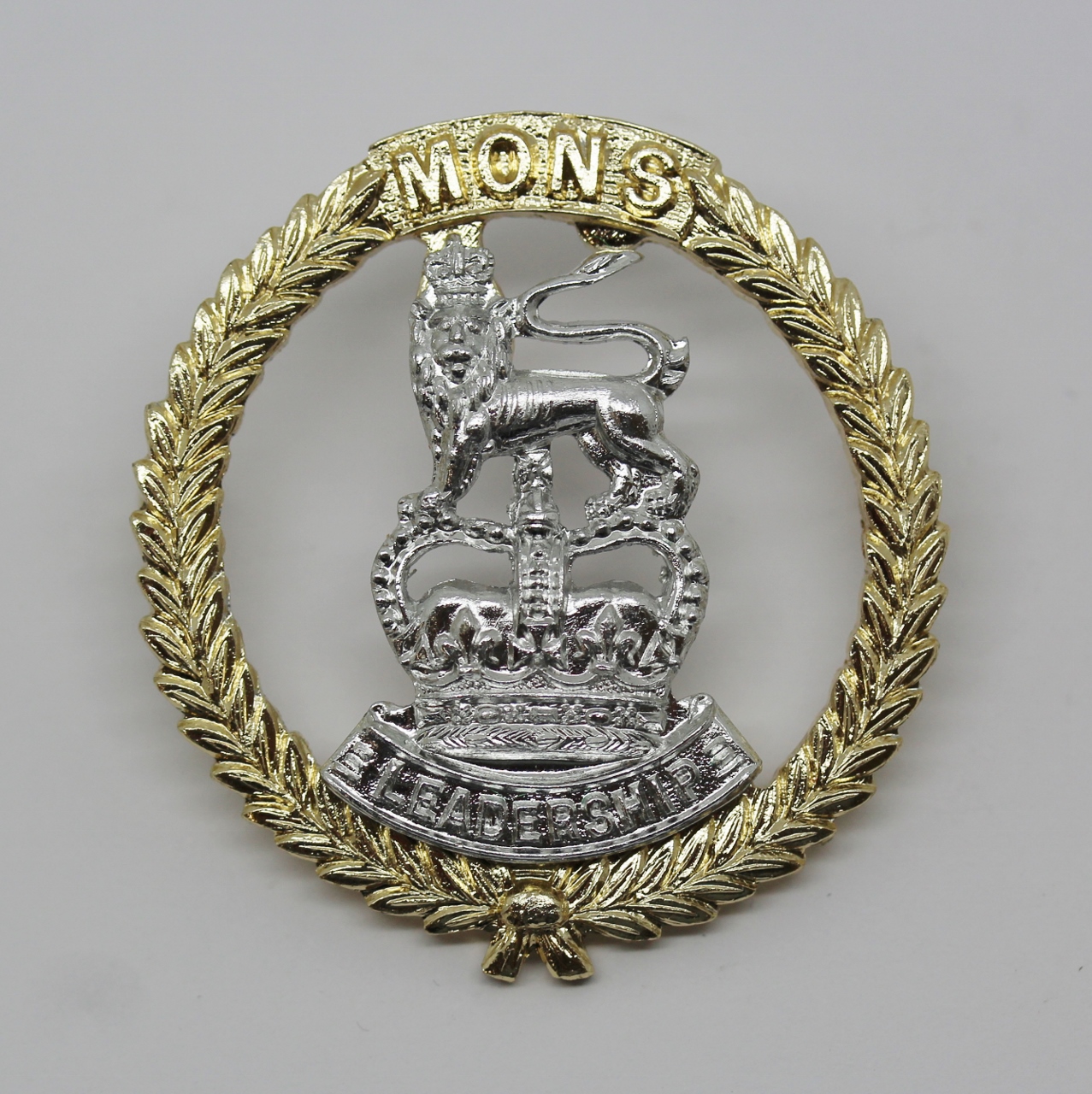 Mons Officer Cadet School Anodised (Staybrite) Cap Badge