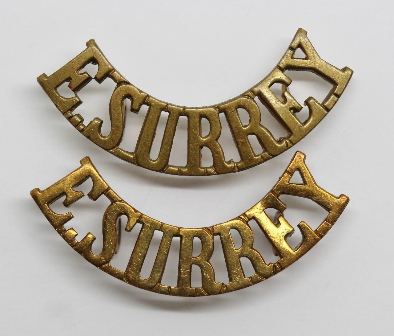 Pair of East Surrey Regiment (E.SURREY) Shoulder Titles