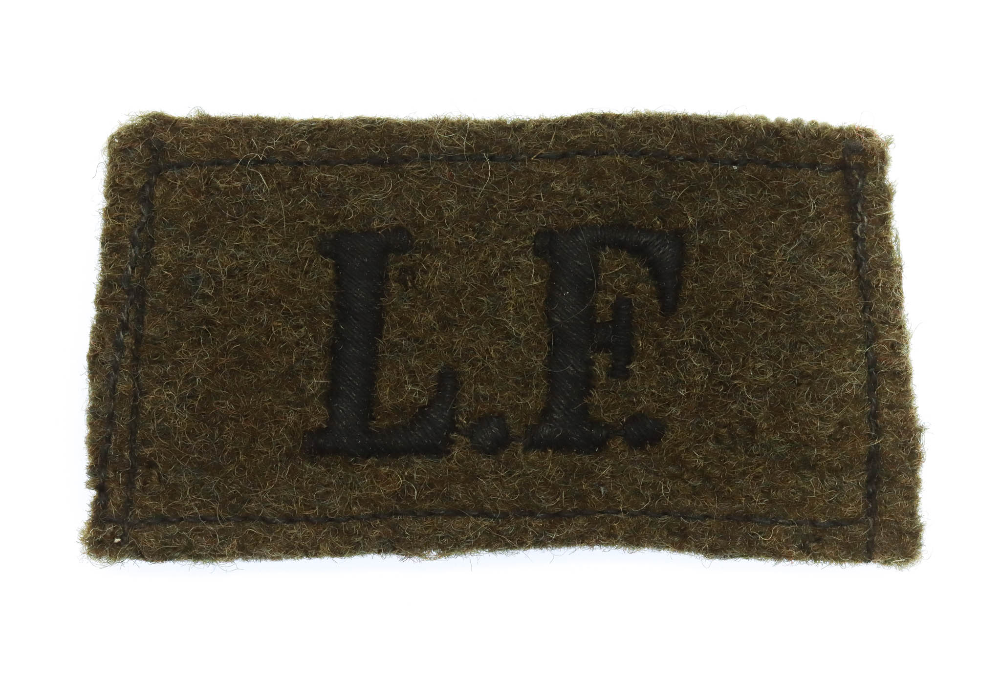 Lancashire Fusiliers (L.F.) WW2 Cloth Slip On Shoulder Title