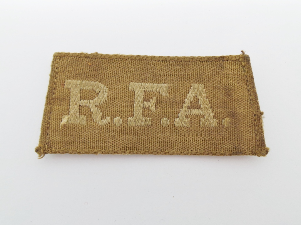 WW1 Royal Field Artillery (R.F.A.) Cloth Slip On Shoulder Title
