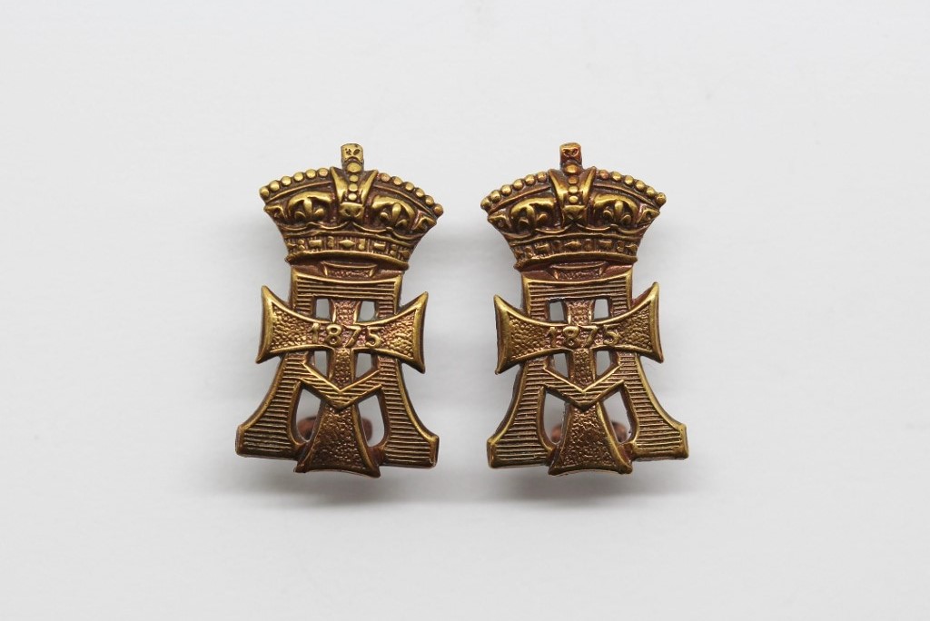 Pair of Yorkshire Regiment (Green Howards) Collar Badges