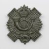 Highland Light Infantry (H.L.I.) WW2 Plastic Economy Cap Badge