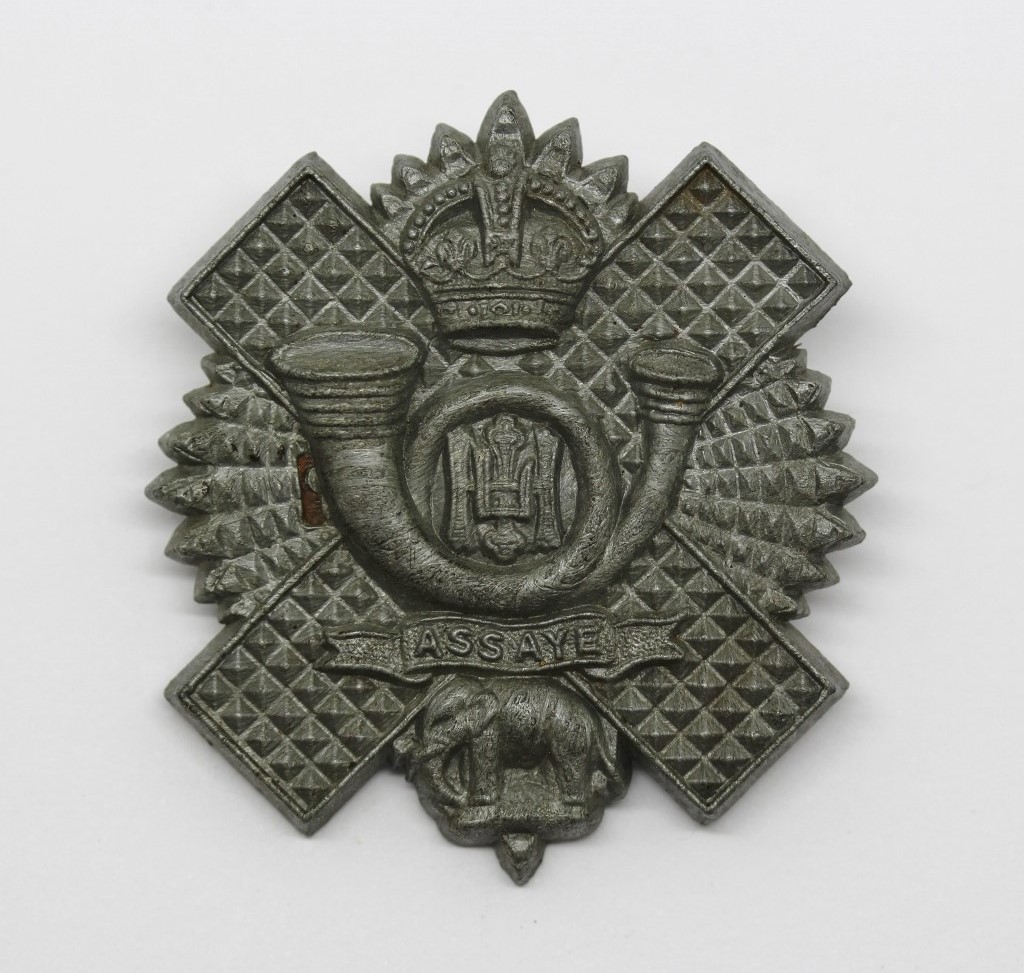 Highland Light Infantry (H.L.I.) WW2 Plastic Economy Cap Badge