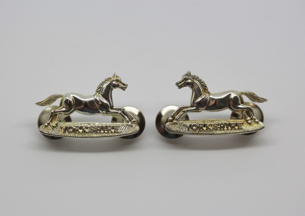 Pair of Yorkshire Regiment Collar Badges