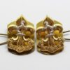 Pair of King's Regiment Collar Badges