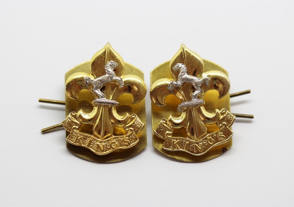 Pair of King's Regiment Collar Badges