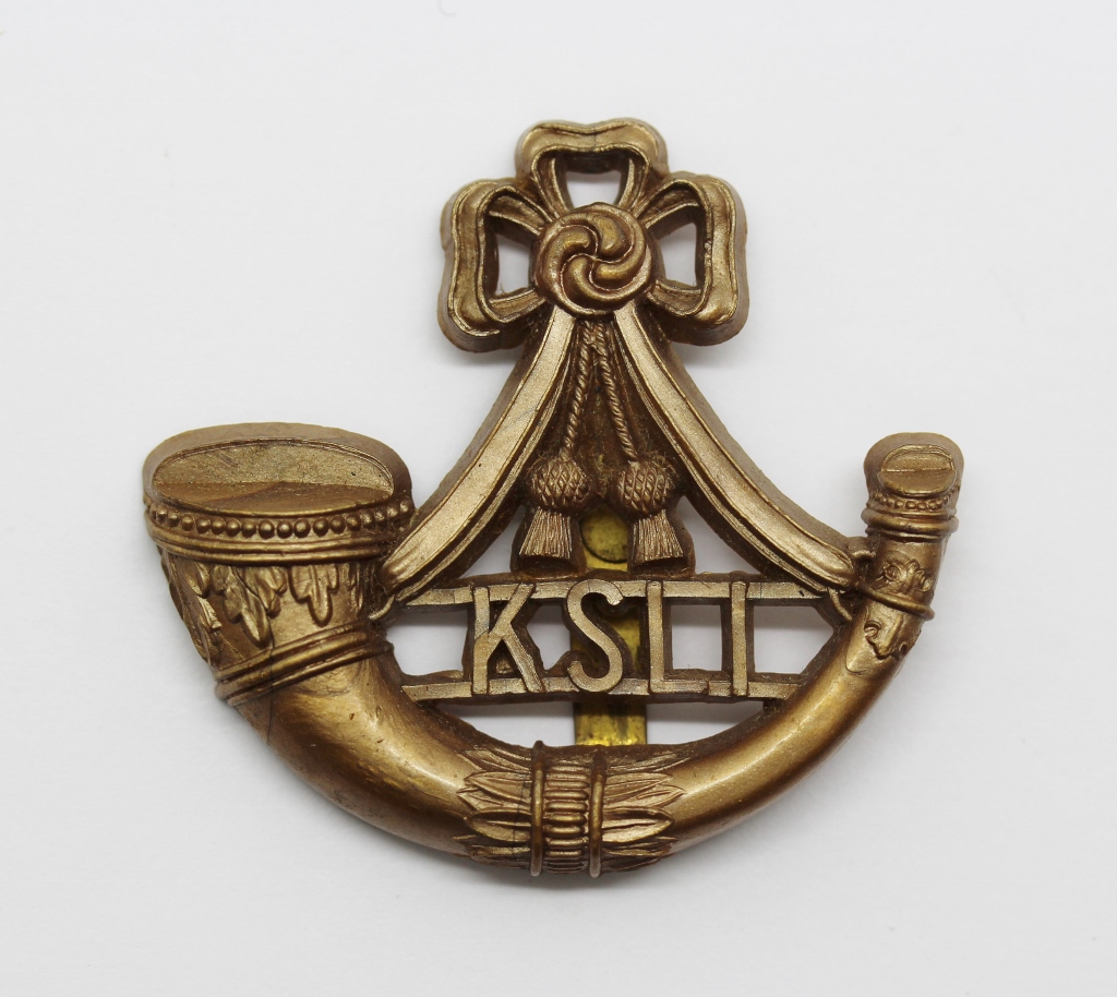 King's Shropshire Light Infantry (K.S.L.I.) WW2 Plastic Economy Cap Badge