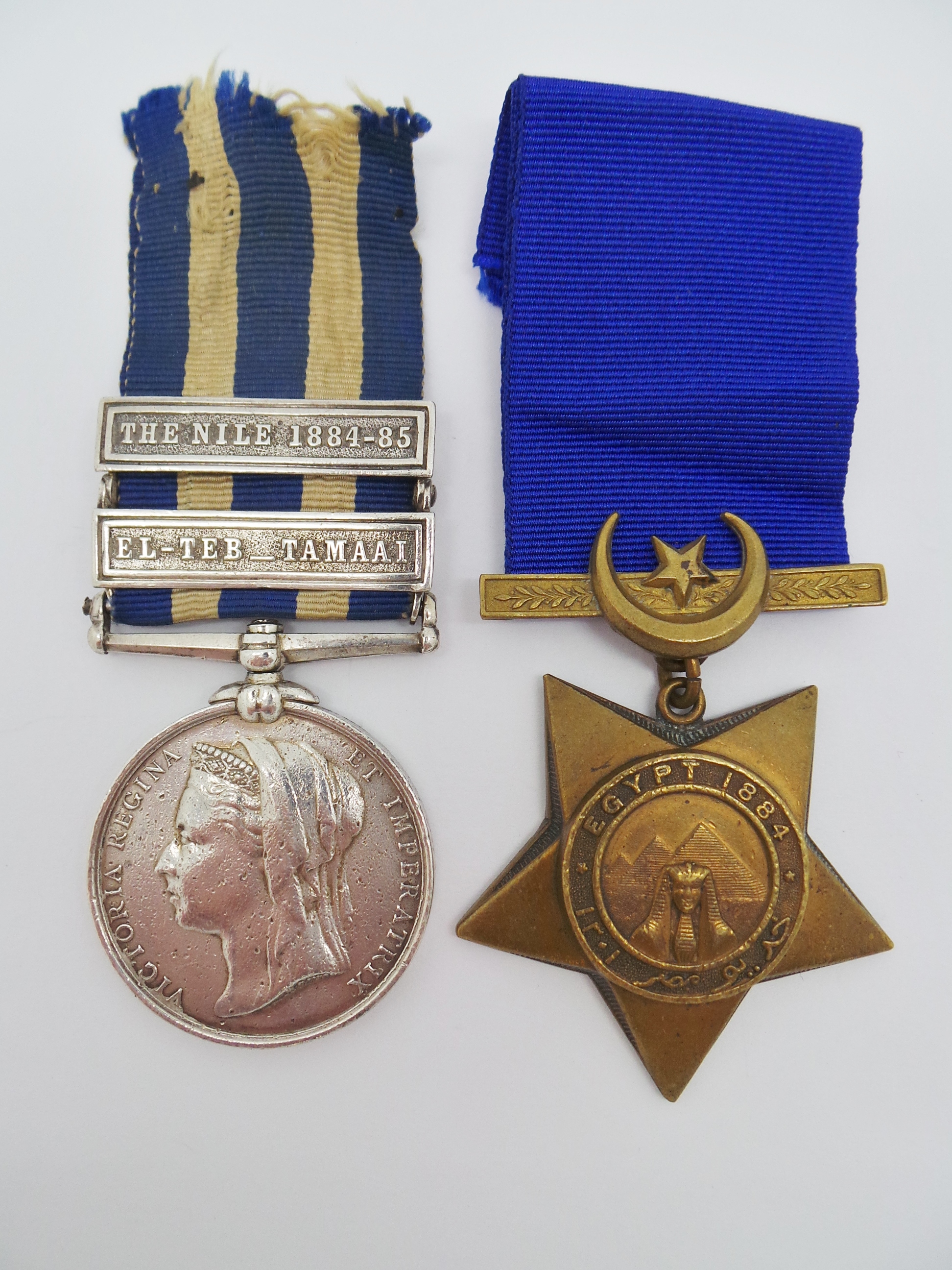 Egypt Medal (Clasps - El-Teb_Tamaai, The Nile 1884-85) & 1884 Khedives Star - Pte. W. Burt, 1st Gordon Highlanders