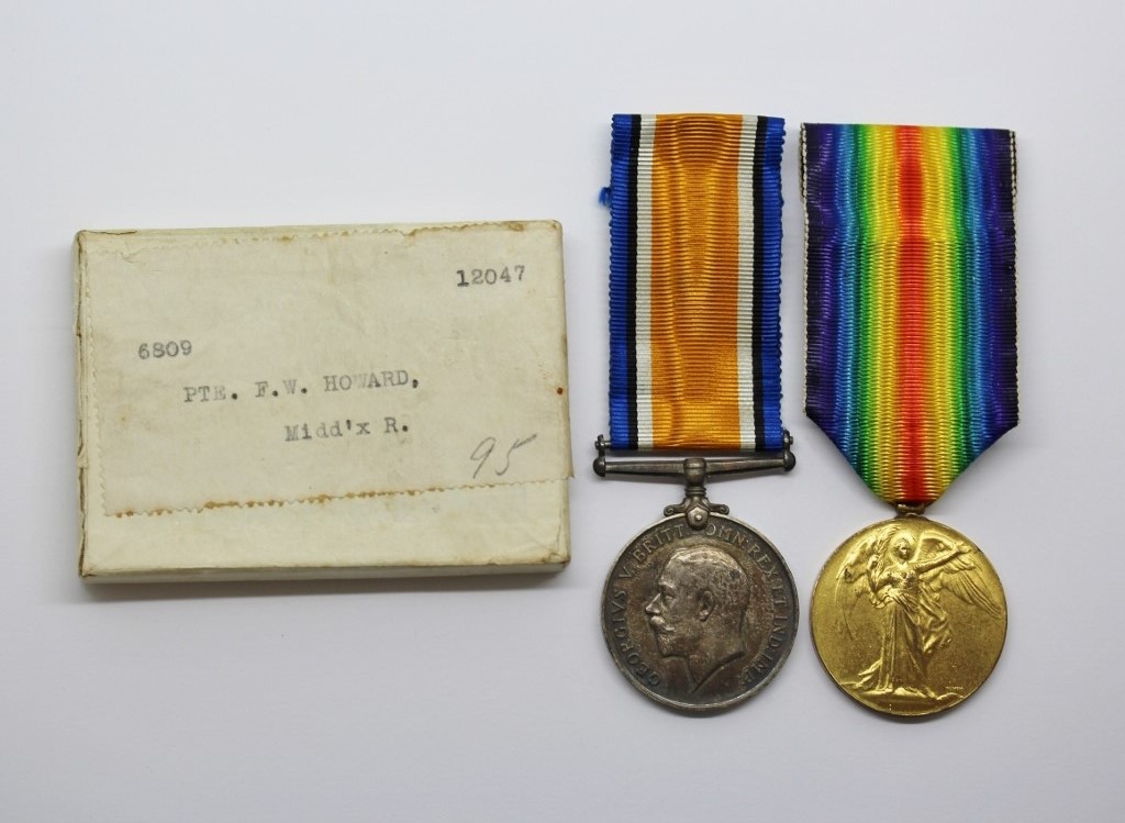 WW1 British War & Victory Medal Pair - Pte. F. Howard, Middlesex Regiment - Wounded