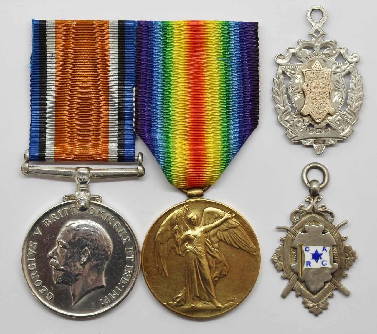 WW1 British War & Victory Medal Pair with 2 Silver Medallions - Pte. A. Chalmers, 18th Bn. Highland Light Infantry