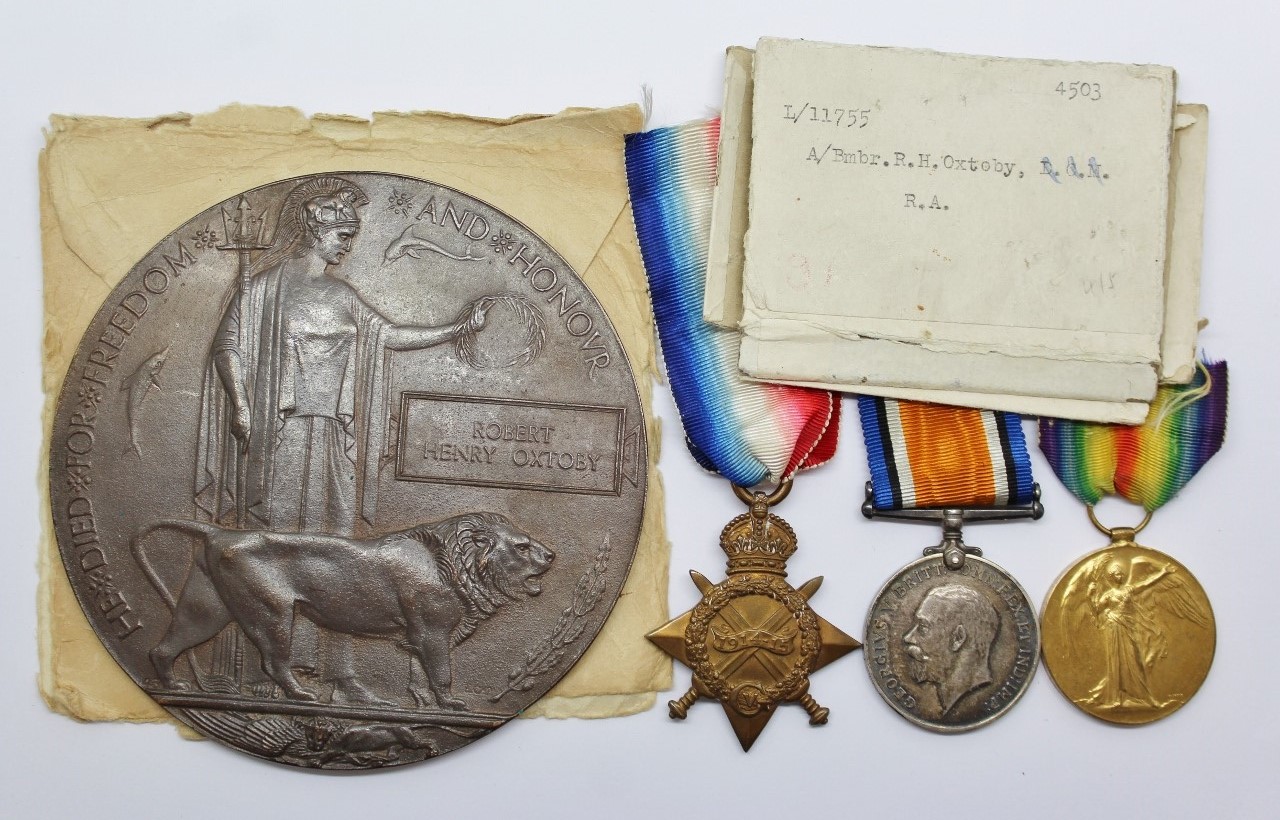 WW1 1914-15 Star Medal Trio and Memorial Plaque - A/Bmbr. R.H. Oxtoby, Royal Artillery (D.C.M. Recipient) - K.I.A.