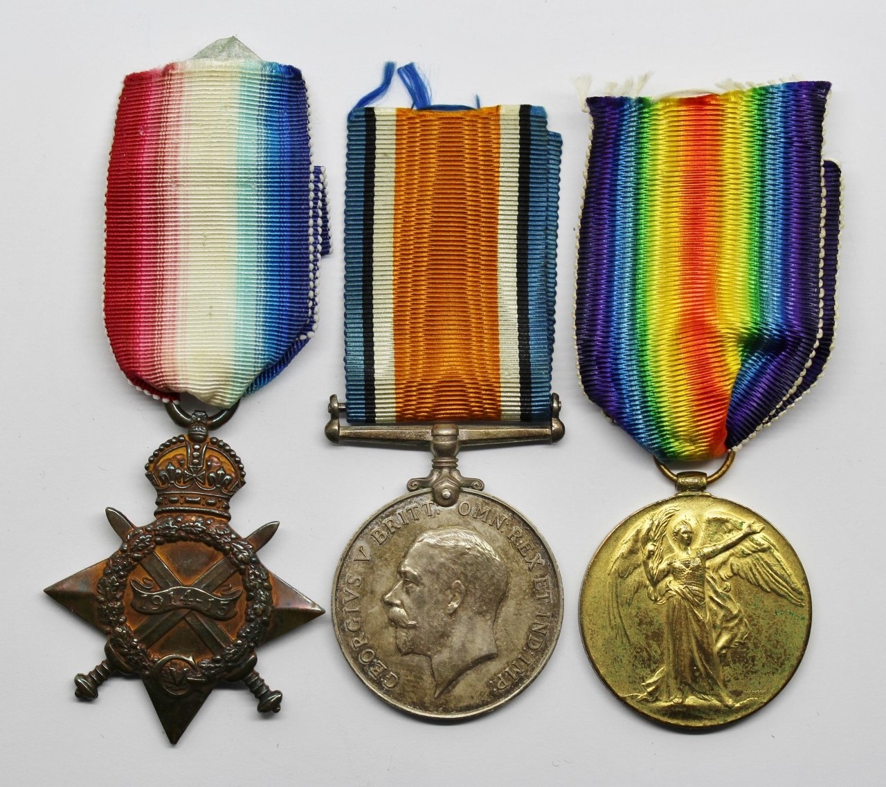WW1 1914-15 Star, British War & Victory Medal Trio - Pte. T.O. Jones, 13th (1st North Wales) Bn. Royal Welsh Fusiliers