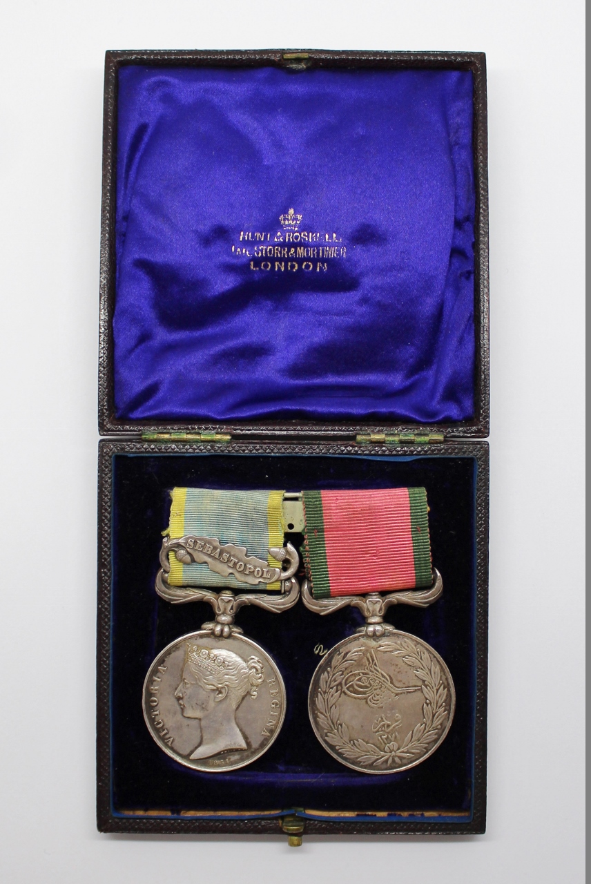 1854 Crimea Medal (Clasp - Sebastopol) and Turkish Crimea Medal (British Issue) in Fitted Box - Qr. Mr. of Bge. L. Isacke, Land Transport Corps