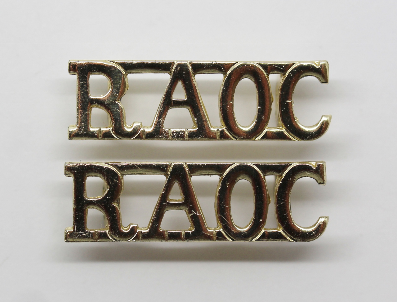 Pair of Royal Army Ordnance Corps (R.A.O.C.) Anodised (Staybrite) Shoulder Titles
