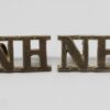 Pair of Northumberland Hussars (N.H.) Shoulder Titles