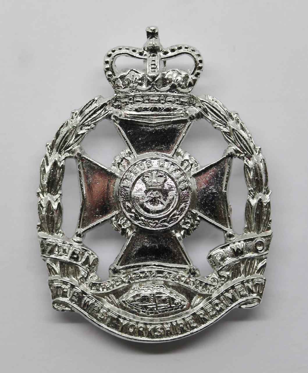 7th Battalion P.W.O. West Yorkshire Regiment (Leeds Rifles) Anodised (Staybrite) Cap Badge - with Tank