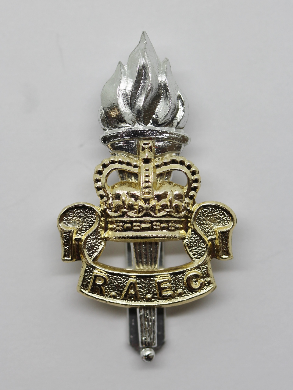 Royal Army Educational Corps (R.A.E.C.) Anodised (Staybrite) Cap Badge - Queen's Crown