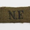 Northumberland Fusiliers (N.F.) Cloth Slip On Shoulder Title